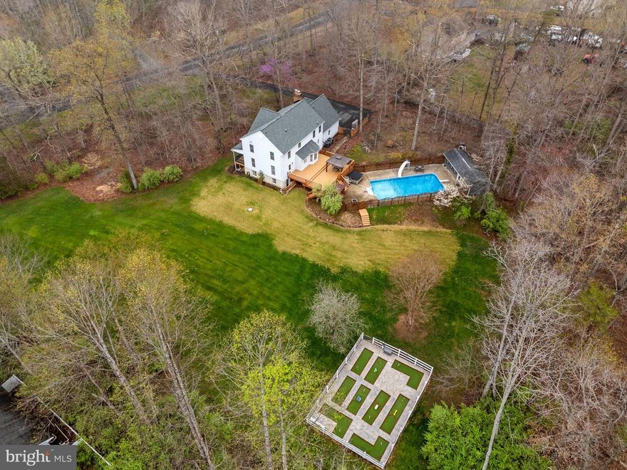 Nestled on a beautifully wooded lot in the sought-after Quail Ridge community of Amissville, this inviting Colonial offers a perfect blend of comfort, recreation, and natural surroundings. With 4 bedrooms and 3 full bathrooms, the home provides flexible living spaces designed for everyday living and entertaining alike.

The recently remodeled kitchen features modern finishes and thoughtful design, creating a welcoming space for gathering and meal preparation. The updated primary bath offers a relaxing retreat with stylish upgrades and a spa-like feel.

Step outside and discover an array of exceptional outdoor amenities. The in-ground pool, hot tub, and sauna create a private oasis ideal for relaxation and entertaining. Adding to the unique appeal, the property also features a charming 9-hole putt-putt golf course—perfect for outdoor fun and leisure. Add in the large yard and fenced in pet area and what else could you want? 

Surrounded by mature trees, the property offers a peaceful setting while still being conveniently located near the amenities of Warrenton, including local shops, dining, and services. Outdoor enthusiasts will appreciate the proximity to wineries, scenic drives, and recreational opportunities throughout Culpeper County and nearby parks.

This property presents a wonderful opportunity to enjoy a blend of privacy, recreation, and convenience in a desirable location.