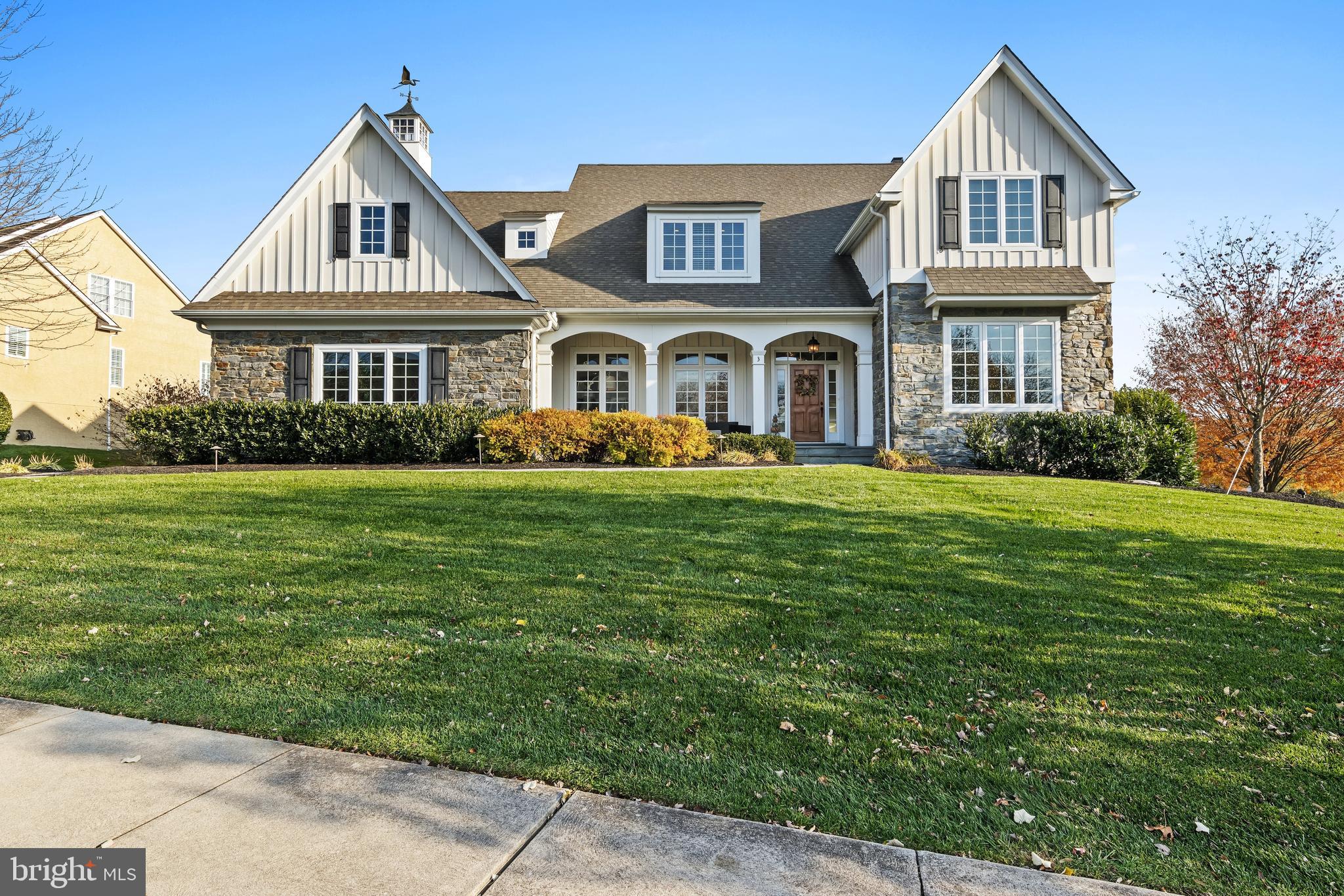 Stunning curb appeal features timeless facade with mica stone, board and batten siding, enchanting covered porch and cupola which together set the stage for this remarkably updated showstopper! Former show home in the highly desirable and well located community of Andover inspired by McIntrye Carpon Architects and built by renowned Vaughn and Sautter Builders. The rear yard is accented with professionally lush landscaped grounds, in particular blue spruces and evergreens planted along property perimeter, cherry laurels creating a private setting in rear yard, and exceptional hydrangeas bordering screened-in porch, which opens to maintenance-free deck, both perfect choices for dining al fresco, rest and relaxation or grand-scale entertainment. The home's interior is equally memorable, Hallmarks include gracious entry foyer, accented by three-story stair tower, notable mill work and details throughout, solid wood interior doors and site-finished hardwood flooring. Enjoy gourmet Kitchen featuring large island, accented by attractive pendant lighting, Viking gas cooktop, cabinet-fronted built-in refrigerator, glassed cabinetry, butler pantry and walk-in pantry, any chef's dream. The open floor plan offers a glassed morning opening to outdoor living spaces and great room with coffered ceiling, gas fireplace and flanking custom built-ins. The home features a private main floor study with built-ins. The oversized mudroom offers a side porch entry, "command center" and access to three-car garage with custom built in storage and epoxy flooring. Upstairs you will find a Owner's Suite, with two custom outfitted closets and lavish en suite bath. three additional generously sized bedrooms all with recessed lighting and serviced by an en suite and hall bath, convenient upper floor laundry complete the remarkable second floor. The Lower Level complete with the INCLUDED state-of-the-art home Theater featuring stadium seating, in wall surround sound, projector and audio tower! Additional lower level entertaining spaces include; game room, recreation room, complete with custom wet bar, half bath and at-home gym. Conveniently located to major roadways and easily accessible to PHL Int'l Airport, local farmer's markets, and an abundance shopping and dining destinations. Enjoy award-winning West Chester Area Schools! Favorable taxes for a property of this caliber. This home shows better than new! Must be seen to be fully appreciated.
