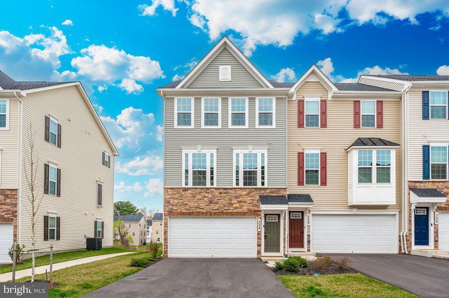 Welcome to this meticulously maintained beautifully designed 3-bedroom, 2.5-bathroom end-unit townhome. This gorgeous offers modern finishes and an abundance of natural light. With over 2,000 square feet of living space, this home features an open-concept layout, a stylish kitchen with sleek granite countertops, elegant lighting, and white modern cabinets, plus spacious living areas perfect for entertaining. Enjoy the privacy of no homes backing the property, along with the convenience of a 2-car garage. Additional highlights include a tankless water heater for endless hot water and energy efficiency. Situated in a prime location near Route 40, this home is just minutes from I-70 and I-270, providing easy access to commuter routes, restaurants, shopping, and more. Located in a desirable community, this move-in-ready home is waiting for you!