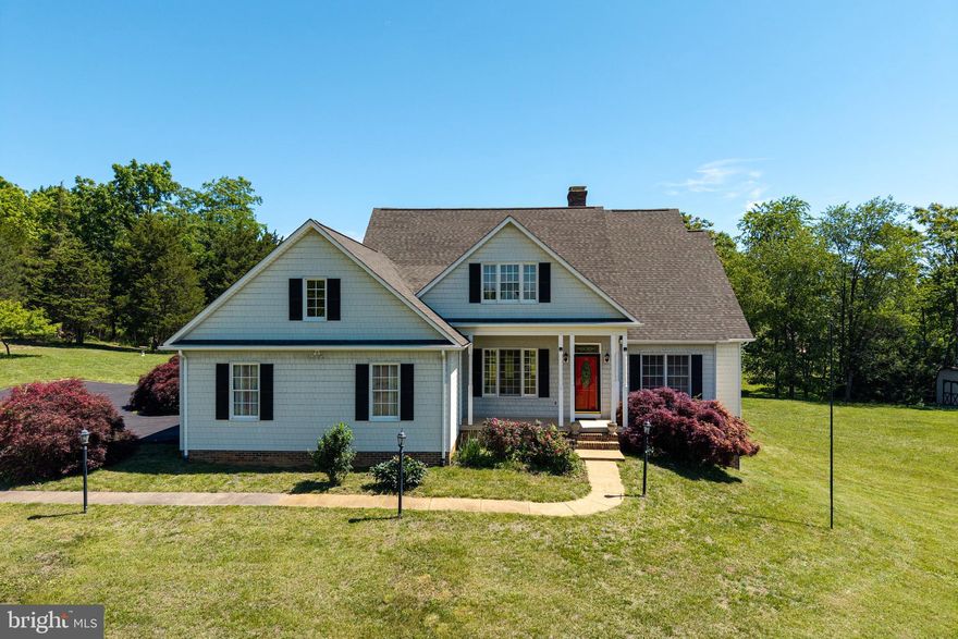 Welcome to this spacious and beautifully designed 5 bedroom, 4 full bathroom home situated on 6 peaceful acres in Woodstock, VA. Offering an inviting layout, this property combines comfort, functionality, and convenience. The main level features a stunning primary suite complete with tray ceilings, along with two additional generously sized bedrooms and a second ensuite bedroom. Hardwood floors run throughout the entire main level, adding warmth and continuity to the home’s inviting design. Fresh paint throughout much of the home enhances the clean, updated feel. The living room offers a cozy fireplace perfect for gathering, while the screened-in porch provides the perfect place to relax and enjoy the surrounding countryside. A paved driveway adds both convenience and curb appeal as you arrive at this peaceful property.
The finished walkout basement expands the living space with an additional bedroom and full bathroom, making it ideal for guests, extended family, or recreation space. With plenty of room both inside and out, this property offers the perfect blend of privacy and accessibility while remaining conveniently located near all that Woodstock has to offer.