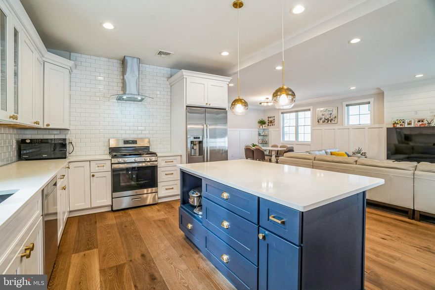 This gorgeous home is an incredible value in today’s market! Talk about perfection—this is it. Designed with thoughtfully selected finishes and high-end custom features, this home offers both elegance and functionality.

Step into the inviting entry foyer with herringbone brick tile, leading to a study featuring recessed lighting, French doors, and beautiful hardwood floors. This versatile space can also serve as a fifth bedroom or guest suite, as the first floor includes a stunning full bathroom with stylish tile and upscale fixtures.

The dining room is beautifully appointed with crown molding, hardwood floors, and real wainscoting. The family room is equally impressive, offering a gas fireplace with a barn beam mantle and sliding glass doors that open to a spacious deck overlooking the large backyard.

The kitchen is straight out of Homes & Gardens Magazine—absolutely breathtaking! Featuring gleaming quartz countertops and custom Green Forest cabinetry, this kitchen is both functional and stylish. The graphite sink and faucet add a modern touch, while the walk-in pantry provides ample shelving, ensuring you’ll never run out of storage space. Adjacent to the kitchen, the mudroom with cubbies keeps shoes, coats, and boots neatly tucked away. And wait until you see the unique tile in this space!

An elegant oak staircase leads to the well-designed second floor, where each bedroom is equipped with a ceiling fan. The primary suite features upgraded carpeting, two spacious walk-in closets, and a luxurious ensuite bathroom with a stand-alone tub, ceramic tile shower with dual showerheads, and his & her vanities. Three additional large bedrooms share a beautifully appointed hall bathroom with fantastic finishes. A convenient second-floor laundry room completes this level.

A full basement offers endless possibilities, whether you need extra storage, a workout space, or a recreation room. Pella windows throughout the home enhance both style and energy efficiency.

This fantastic home backs to wooded open space and offers easy access to a trail leading to Stewart Field. The superior craftsmanship and unique finishes in this home are second to none.

Prime location close to schools, shopping, restaurants, and parks. Don’t miss this rare opportunity to own a resale of this exceptional home!
