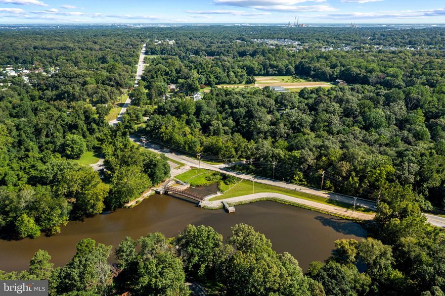 Great opportunity to own a fantastic secluded lot surrounded by the Magothy River and Lake Waterford. Close proximity to parks, restaurants and shopping! Parcel consists of 5 total lots - the front 2 lots are zoned R2 and the back 3 are zoned Open Space (OS).