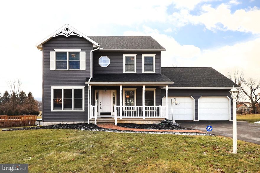 OPEN HOUSE - Sunday, January 18th, 12:00 - 1:30 PM.  This home is thoughtfully updated from top to bottom with fashionable high-end finishes throughout.  Custom lighting, expansive moldings, fresh paint, and new flooring create a polished, cohesive look. The gourmet kitchen features quality-crafted cabinetry, granite countertops, black stainless steel appliances, abundant storage, and prep space, opening seamlessly to the main living areas—perfect for entertaining or everyday living. Cozy up next to the gas fireplace while enjoying country views. All bedrooms offer walk-in closets, paired with 3.5 newly updated, spa-inspired bathrooms. The fully finished lower level provides excellent recreation space plus additional rooms ideal for guests, a home office, or storage.  Outside, enjoy a professionally landscaped lot with inviting outdoor living spaces. Additional upgrades include added attic insulation, extra outlets, a new water softener system, security system, electric dog fence with dog door, and all appliances included—making this home truly move-in ready. Conveniently located in the Springfield neighborhood near I-80, Route 99, and minutes to Penn State.