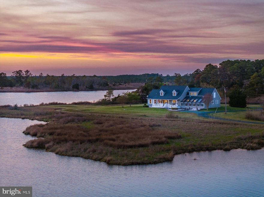 Nestled along the tranquil shores of St. Peter’s Creek, 10148 Champ Road is a truly one-of-a-kind waterfront retreat—where craftsmanship, character, and nature come together in perfect harmony. Set on an expansive 13.49-acre private parcel with a pond and sweeping panoramic water views from every room & every window, this custom-built home offers a rare opportunity to own a deeply personal and thoughtfully constructed residence unlike anything else on the market.  Originally envisioned and hand-built with hearty 2x6 construction by its owner over the course of three years, this home stands as a testament to dedication and artistry. From the reclaimed wood floors—salvaged from the original structure & painstakingly planed by the owner — to the hand-crafted solid ash cabinetry, also hand built by the owner - every detail truly tells a story of craftsmanship, precision and passion. Unique touches such as brass portholes sourced in Key West, reclaimed barn wood accents from Long Island, and hand-plugged wood flooring elevate the home’s character and warmth.  The inviting interior features 3 spacious bedrooms, 2 full baths, and a dramatic great room with soaring ceilings, exposed beams, a custom stone fireplace with wood-burning stove, and stunning Palladian windows that frame breathtaking water views from every angle. The open kitchen is both functional and stylish with updated counters, subway tile backsplash, new appliances, and custom cabinetry—all seamlessly flowing into the main living space. A curved staircase leads to a loft and an expansive 20x40 bonus area, offering endless possibilities for additional living, work, or recreation space.  This home even features an attached garage with a concrete maintenance pit - ideal for auto enthusiasts.  
Recent updates provide peace of mind and modern comfort, including a new roof (2025), upgraded HVAC components with mini-splits in all bedrooms, a 3-stage whole-house water filtration system, fresh interior (including ceilings) and exterior paint, updated lighting, renovated baths, brand new GE Smart washer/dryer, and so much more.   Smart home features such as Alexa-enabled thermostats, a smart oil gauge, Starlink internet, and a 12-camera Blink security system enhance convenience and connectivity.
Outside, enjoy the peaceful setting from the refreshed decking and walkways, surrounded by updated landscaping and the natural beauty of the Eastern Shore. Imagine sitting on the oversized 8’x36’ porch gazing down St. Peter's Creek and seeing the quaint little waterfront town of Crisfield, Maryland in the distance – did you know it’s known as the “Seafood Capital of the World”?!?   The detached “barn” offers incredible flexibility with oversized doors suitable for boat storage, a workshop, and a large loft.  Consider the potential for adding an ADU affording additional living space or replacing the original dock/pier to give access to the infamous Tangier Sound – just minutes away via boat.  The possibilities are truly endless!    
Whether you're watching eagles soar from your cedar window seat, relaxing by the water, or envisioning new possibilities for the versatile pool/sun room—this property invites you to slow down, spread out, and truly enjoy your surroundings.  A private waterfront sanctuary rich in history, heart, and craftsmanship—this is more than a home; it’s a legacy property waiting for its next chapter.  IMPORTANT:  See attached Points of Interest in documents for full details on property features/amenities.