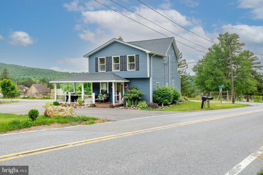 Renovated 3 bedroom, 2 bath single family home with wrap-around porch on a 1 acre corner lot. Main level features a country kitchen with breakfast area, living room, office/study, and full bathroom with laminate wood flooring throughout. Chimney for potential wood or pellet stove in living room. Upper floor has a large 22x14 owner's suite addition with two closets. Laundry in basement. Property has been updated with new roof, all new vinyl siding, new insulation and drywall, 4 mini-split systems for heating and cooling, and asphalt driveway. Above ground pool. Over-sized 24x56 garage large enough for 6 or more vehicles, has oil furnace, and car lift conveys. 14x17 garden shed and small pond.