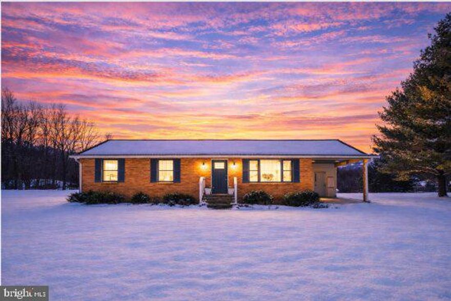 Single level living in a peaceful country setting! Three bedroom, two bath rambler with large garage, automotive shop. This well-maintained brick rambler offers an open concept great room blending the living, dining, and kitchen spaces. The kitchen has two-tone cabinets with smooth Corian countertops, stainless-steel appliances and laundry area. Down the hall are two bedrooms , a hall bath and the primary bedroom with en-suite bath. A screened deck off the kitchen has a ‘doggy door’ for your fur babies. The property comes with DogWatch, and a dog kennel or chicken coop in the shade of the trees. Situated on 1.55-acres in a neighborhood with no HOA. The property features a large detached garage (24 x 40’) with a 10’ tall garage door, perfect for the auto mechanic or woodworker and lots of storage area. There is an additional storage shed next to a frost-free hydrant, with electricity and lights for your lawn equipment. Upgrades: created open concept great room, new ceiling and can lights in great room, new gutters on house and garage, new screened-in porch, new railings on front porch, new doors, new water treatment system, new gravel in driveway, new landscaping, new HVAC in 2021, and roof replaced in 2016.