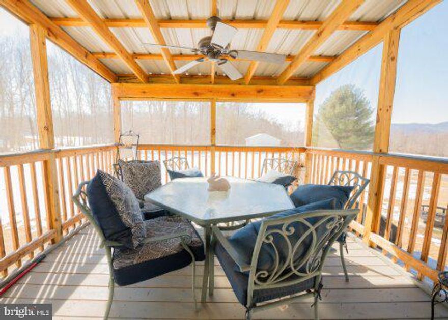 One level living in a peaceful country setting! Three bedroom, two bath rambler with large detached garage. This well-maintained brick rambler offers an open concept great room that blends the living, dining, and kitchen spaces. The kitchen has two-tone cabinets, smooth Corian countertops, stainless-steel appliances and a laundry area. Down the hall are two bedrooms that share a hall bath and the primary bedroom with en-suite bath. The screened deck off the kitchen has a fan to keep you cool in the summer and a ‘doggy door’ for your fur babies. The property comes with DogWatch, and a dog kennel or chicken coop in the shade of the trees. Situated on 1.55-acres in a neighborhood without an HOA. This property features a large detached garage (24 x 40’) with a 10’ tall garage door, perfect for the auto mechanic or woodworker and has lots of room for storage. There is a separate storage shed with electricity and lights for your lawn equipment. Just outside of the shed is a frost free water hydrant for convenience. New Updates: created open concept great room, replaced great room ceiling and installed recessed lights, glass shower door in primary bath, installed gutters on house and garage, added screened-in porch, railings on front porch and carport door, exterior doors, water treatment system (owned), invisible DogWatch fence around property perimeter, added gravel to driveway, enhanced landscaping, new HVAC in 2021, and roof replaced in 2016.