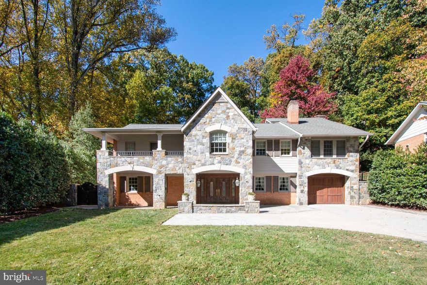 EXQUISITELY REMODELED & EXPANDED GRAND MID-CENTURY MODERN GEM!THIS IS A UNIQUE & SPECIAL OFFERING! Proudly and affectionately referred to as "STONEWOOD" by its current "original owners", this private oasis is a homebuyers dream home! Elegant, sophisticated and inviting, this fine residence is beautifully and ideally sited on an expansive 1/2 acre professionally landscaped lot in the highly sought after Tilden Woods subdivision of North Bethesda! Undeniably awesome curb appeal! You are first greeted by stunning custom "handcrafted stonework " by a local renowned stonemason, which grace the residence and welcomes you at every corner! Fit for Architectural Digest! Crafted stone walls w/ wrought iron fencing, intricate inlay stone driveway and a breathtaking combination of a stone and brick facade, along with a dramatic arched stone portico and glorious upper balcony make this a unique and special find.  Generous interior spaces flow with ease making the home feel unified, spacious and grand! Upon entering, you are greeted by an Italianate marble foyer leading to the other main level features/rooms that include; ELEVATOR by SAVARIA, study w/gas fireplace & double pocket doors, large bedroom w/built-ins & walk-in closet, full luxury marbled bath w/shower, laundry/utility room +extra refrigerator, children's playroom, mini-gym and deep "climate controlled" tandem 2-3 car Parking Garage.  A grand staircase leads to the upper level living areas that reflect the true essence, elegance and sophistication of this residence. The dramatic living room and adjoining study boasts soaring ceilings, dramatic atrium/floor to ceiling windows,  stylish ornamental finishes throughout, crown & chair rail moldings, gas fireplace w/ wood  mantle, crystal chandeliers as well as gleaming hardwoods throughout. Double French pocket doors lead you into the residence's second study, along with its  two custom designed "art display nooks", exposed brick & transom windows. Loads of natural light fill these spaces as they flow interchangeably. The living room area transitions effortlessly to the relaxed, yet sleek  & refined dining room. The adjoining  Chef's Kitchen & Great Room is ideal for daily casual family gatherings as a well as spirited entertaining all while boasting new high end stainless steel appliances, granite counters, two skylights and breakfast bar, built-in seating, hardwood and slate flooring and floor to ceiling windows- all perfect for daily family life. New recessed lighting w/ updated electrical, custom vanity/bath fixtures and new designer paint throughout.  Amazing storage throughout the residence too!  The  Owner's Suite complete w/ balcony access and adjoining sumptuous  En-suite w/ walk-in shower, partial glass block window, heated towel warming drawer & private toilet nook! Two additional large bedrooms include ample closet space, vaulted ceiling and access to the upper balcony and ELEVATOR, share a second full luxury hall bath complete w/ Jacuzzi soaking tub, customized marbled vanity and terrazzo tile work. EXTERIOR SPACES: The  1/2 acre (20,429 sq. ft./0.469 ) semi-private, fully fenced lot is ideal for a myriad of family activities.  The front  garden is anchored by mature & manicured holly trees that offer additional privacy and elegance.  The glorious back garden includes a custom wood gate, semi-wrap around walkway, expanded flagstone terrace & stunning pergola! Additional features include: a "Generac" generator and additional outside storage. LOCATION: Prime location! Close to all amenities including, schools, shopping including Montgomery Mall & Wildwood Shopping Center,  schools, neighborhood Tilden Community Pool & adjoining park, Shriver/MC Aquatic Center, White Flint Metro,  Cabin John Park and its tributaries, Downtown Bethesda and Rockville Town Center, minutes to I-270, I-495/Capital Beltway, Pike & Rose, Park Potomac &  soon to re-open Woodward High School! This Indeed a special offering!