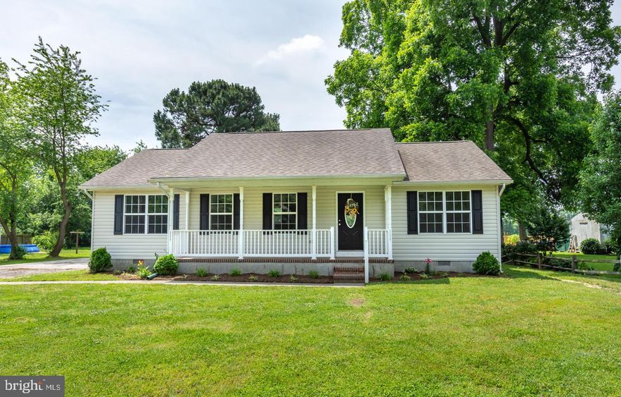 Like New, roomy open floor plan rancher, 3 bedrooms, 2 baths, spacious living room & kitchen with cathedral ceilings, master bedroom w/full bath and walk-in closet, separate laundry/mudroom, front porch and large backyard.  Freshly painted and new flooring.