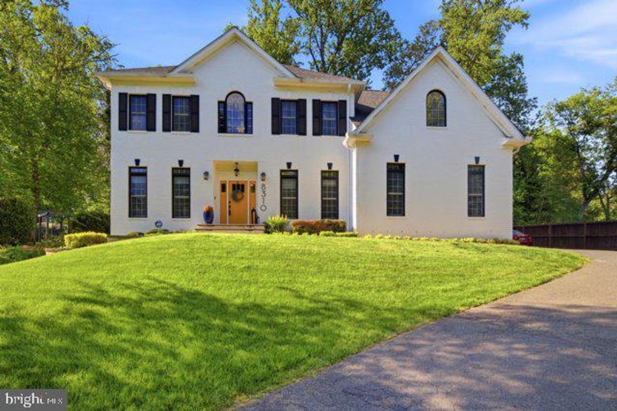 A true 10+ showstopper—this stunning custom brick-front colonial in the sought-after Woodburn neighborhood of Annandale offers over 5,600 sq ft of exceptional design, luxury, and craftsmanship on more than half an acre. Featuring 5 bedrooms, plus a den and 4.5 baths, this impressive residence combines timeless elegance with modern comfort.
Step inside to soaring 10-foot ceilings, open sightlines, extensive crown molding, and newly finished wide-plank hardwood floors. Built with upgraded energy-efficient foam insulation, this exceptional home also showcases recent luxury updates, including beautifully custom-designed closets throughout, updated interior doors, and refined designer finishes that elevate every space.  
The oversized gourmet kitchen is designed to impress, featuring updated countertops, a custom backsplash, a grand center island with a 6-burner cooktop, high-end stainless steel appliances, a built-in oven and microwave, and a spacious pantry—perfect for everyday living and effortless entertaining.
The dramatic two-story family room with a gas fireplace creates an inviting gathering space, while the main level also offers a sun-filled study with French doors and a well-appointed laundry room.
Upstairs, the luxurious primary suite features vaulted ceilings, a sitting area, a spa-inspired bath, and an expansive walk-in closet. Additional bedrooms feature a Jack-and-Jill bath, as well as a private en-suite.
The fully finished walk-up lower level offers 9-foot ceilings, a spacious recreation room, a fifth bedroom, and a versatile den—ideal for a gym, media room, or guest suite.
Outside, enjoy your private retreat with an expansive two-tier stone patio, dedicated grilling area, and fire pit—perfect for entertaining.
Ideally located near the vibrant Mosaic District, Inova Fairfax Hospital, Metro access, shopping, dining, and major commuter routes—this extraordinary home truly offers luxury, location, and lifestyle.
