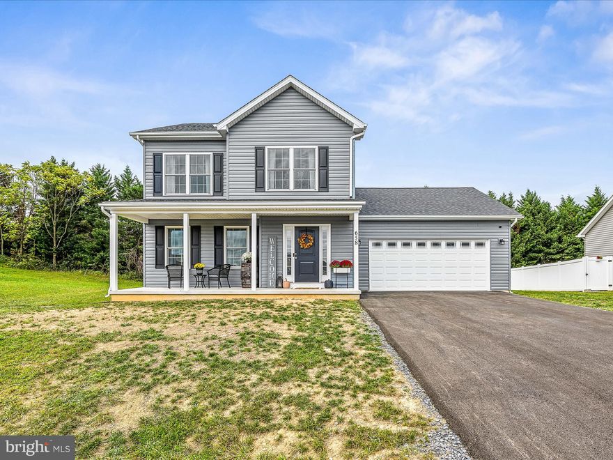 Turn Key, Meticulously well kept 3 bedroom 2 1/2  bath Colonial on a beautiful tree lined lot that has incredible mountain views and don't directly back up to other homes.   LVP floors throughout main living areas and hallways and carpet in bedrooms.  Gourmet kitchen with granite countertops and island with Whirlpool stainless steel appliances.  If you don't want to wait on new construction heres your chance.  As this home is only 1 year old but the sellers are relocating for work.