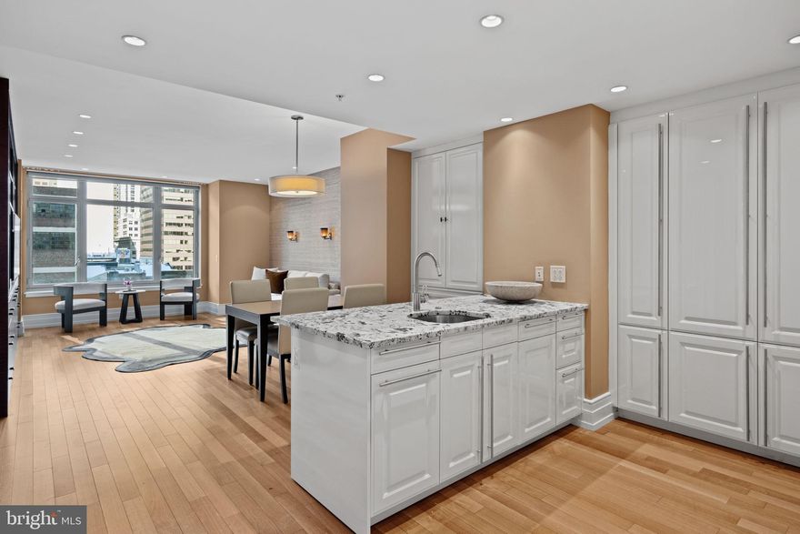 Welcome to Residence 503, a spacious deluxe one bedroom, one and a half bath condo located in the very sought after 10 Rittenhouse Condominium Building.  Positioned on the North side of the building, with skyline views from both the living room and bedroom.  The home offers very nice scale and proportions throughout, with a thoughtfully laid-out floor plan that maximizes space and functionality. Cook in a beautiful, large eat in kitchen with high-gloss white Poggenpohl cabinets, barstool seating, a paneled Miele dishwasher, paneled SubZero Refrigerator, gas cooking and tons of pantry storage plus surface/prep area. The dedicated dining area seats four and flows into a large living room with flexible seating options, complemented by oversized windows showcasing fabulous cityscape views.  The spacious bedroom suite is complete with beautiful custom built-ins, three large closets and a 4 piece marble bathroom with a soaking tub & glass enclosed shower. At the end of the day, relax and unwind while taking in spectacular skyline views from the comfort of your bed. Beautiful improvements include bespoke living room and bedroom built-ins, matching cabinets in the dining room nook and recessed lights throughout. This residence sets the standard for one-bedroom living in the building, offering a layout with a separate dining area, a powder room for guests, and no wasted square footage.  Designed by famed architect Robert A.M. Stern—responsible for iconic buildings including 520 Park Avenue, 220 Central Park South, and 15 Central Park West—10 Rittenhouse stands as a modern classic on Philadelphia’s most beloved park. Residents enjoy five star 24 hour service, a chauffeured driven town car, yoga room, gym, indoor lap pool, library, outdoor courtyard, board meeting room, piano lounge, TV lounge, climate controlled wine room, bike storage, catering kitchen, hotel guest suite, underground valet parking and most importantly a friendly and beautiful community. Philadelphia's TOP SPA, Rescue Spa has opened in the building for the ultimate convenient amenity! Located on prime 18th street where the best restaurants in town are at your finger tips. Pet friendly. Parking can be rented in the building but subject to availability. 1 large storage unit comes with the condo.