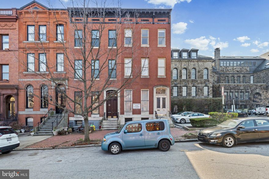 Discover a prime investment and redevelopment opportunity in the prestigious Bolton Hill Historic District, where timeless architecture meets extraordinary potential. This end-of-row townhouse built in 1885 blends historic charm with structural opportunity, featuring a classic Colonial façade in the front and a rare four-story concrete structure in the rear—an ideal foundation for a visionary transformation.

With approximately 8,000 square feet of space, this property presents exceptional possibilities for investors, developers, or owner-occupants seeking to create a one-of-a-kind urban residence with income potential. The generous footprint provides flexibility for multi-unit conversion, mixed-use possibilities, or the creation of expansive residential living spaces, allowing the next owner to tailor the property to their vision.

Inside, the home features very large rooms, soaring ceilings, and substantial architectural volume, offering a strong structural canvas for renovation. For owner-occupants with creativity and vision, the property could be transformed into a magnificent historic residence, live-work space, or luxury home with rental units to offset ownership costs. For investors, the layout and size create a compelling opportunity to develop multiple units or design modern urban living spaces that appeal to today’s renters.

Located in the vibrant and architecturally significant Bolton Hill community, the property benefits from tree-lined streets, historic character, and convenient access to universities, cultural institutions, dining, and major transportation routes. This desirable neighborhood continues to attract both residents and investors seeking historic charm paired with city convenience.

Whether you are looking to restore a historic masterpiece, create income-producing apartments, or design a signature property in one of Baltimore’s most beloved historic districts, this property offers the scale, location, and architectural character to bring your vision to life.

A rare opportunity to acquire a substantial historic property with remarkable upside in one of Baltimore’s most distinguished neighborhoods.