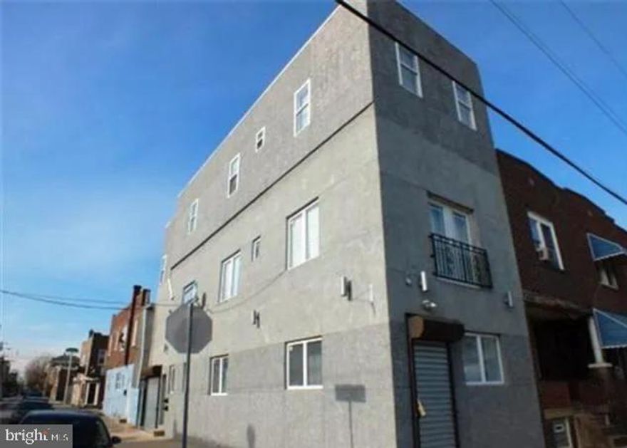 Triplex in Point Breeze with first floor commercial office space zoned. Close to shopping's centers, center city ,Upenn, Interstate 95 and interstate 76! Priced to sell!  
1st floor is the office/store space with kitchenette installed in 2014 along withstand up shower with toilet and sink, & washer & dryer so this also could be rented out as a studio. First floor leads you to the basement. Basement has newer sump pump. 2nd floor has a month to month. 2nd floor has washer and dryer with 2 bedrooms, 1 bath, living room/kitchen great room. 3rd floor has a washer and dryer and same set up as second floor. There is also a garage with roll up door. New roof installed in 2019. Central Air, Gas heat and gas cooking. Property is fully occupied on month-to-month leases. Pictures were taken prior to tenants moving in the units.