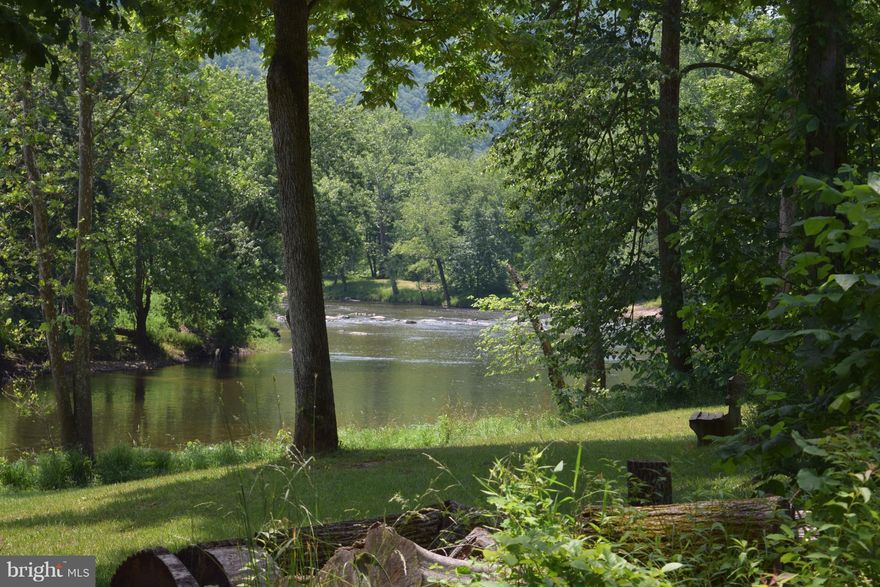 Cacapon River Water Front!  Build your vacation home, your dream home, bring your camper! No restrictions. Lovely 2.9 acre lot  located on the the cleanest river in West Virginia! Tubing, kayaking or swimming. Conveniently located right on Route 9. Mins from Paw Paw, Largent and Great Cacapon.