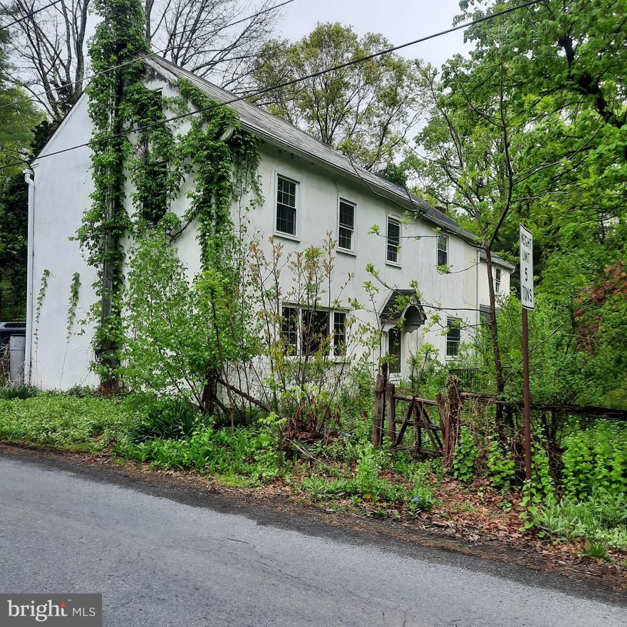 The home at 1300 N Ridge Rd in East Rockhill Township started as a one-room Schoolhouse in 1858.  Check out the interior photos showing the thick, beautifuly pointed stone walls.  Additions were built in the 1950s, 1960s and 1990s.  There are actually 2 Tax Map parcels here providing a total of 1.39 acres.  This is an Estate Sale and the Estate has been cleaning up the property but debris might be left in the home.  The home is being sold AS-IS.  Use caution when touring the interior of the home.  It is a bit "cluttered".  It is nice that the home has oil fired hot water baseboard heat and gas cooking.  Upgrades, such as new Kitchen cabinets, were done a few years ago.  You can be the person that makes this affordable diamond-in-the-rough sparkle again.