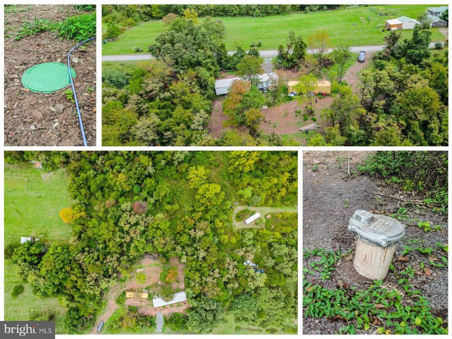 Escape to your own private retreat just minutes from the charming town of Romney, WV! This 2.12-acre lot is perfectly positioned for those who crave both convenience and seclusion. Only a quick 5-minute drive to local grocery stores, shopping, dining, and the ease of Rt 50, and 1 hour to Winchester, VA, for more extensive shopping or day trips.

The property features a single-wide mobile home (1 bed, 1 bath) that was in the process of being remodeled and conveys AS IS, offering an exciting opportunity for those looking to finish the job. Inside, you'll find some building supplies ready to use, saving you time and expense. As a bonus, all personal property in the mobile home and in the conex container convey with the property! The mostly wooded and level building site has already been cleared, offering a peaceful setting surrounded by nature.

Key improvements have already been made, including a brand-new well installed in 2023 (pump needs to be installed) and a 2-bedroom septic system installed in 2024, setting you up for success whether you're building a dream home or planning a weekend getaway. If you're considering replacing the trailer, no worries—the footers are already in place to support new construction. Also included is a Conex/sea container for additional storage or utility needs.

With much of the prep work already completed, this lot is primed and ready for you to create the perfect home base to enjoy the wild and wonderful beauty of West Virginia. Whether you're looking to build, park your RV for an adventurous base station, or simply escape into nature, this property has endless potential. Don't miss this chance to make it your own!!