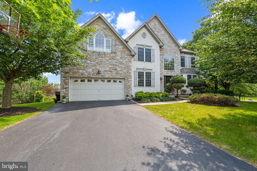 Welcome to this elegant and spacious 5-bedroom home, ideally located in the heart of Worcester Township within the highly sought-after Sunnybrook community. Perfectly positioned next to a charming neighborhood rest and play area—complete with a covered pavilion—this home offers the ideal blend of private luxury and community charm.

Step inside to a warm and inviting interior, where gleaming hardwood floors span the entire main level. The grand chandelier in the foyer, easily lowered for cleaning with the Aladdin Light-Lift, sets the tone for the quality and attention to detail found throughout.

To your left, a large study with a bump-out provides the perfect space for a home office or reading nook. The heart of the home is the chef’s kitchen, featuring stainless steel appliances, granite countertops, a central island, pendant and recessed lighting, and a butler’s pantry for added convenience. This space flows effortlessly into the extended sunroom/breakfast area, where extra-tall Pella doors fill the room with natural light and provide access to the oversized composite deck.

Enjoy outdoor living at its finest on the deck, complete with an Eclipse roll-out awning—perfect for dining al fresco or relaxing in the shade. A main-floor laundry room with utility sink adds everyday ease.

Upstairs, the luxurious primary suite features two walk-in closets, a cozy sitting room, and a spa-inspired bathroom with Jacuzzi tub, separate shower, and double vanity. Three additional bedrooms offer plenty of space for family and guests.

The fully finished basement is an entertainer’s dream, offering high ceilings, a dedicated media room, wet bar with wine fridge and dishwasher, a guest bedroom with full bath, and flexible space for an exercise area, playroom, or additional office.

Additional highlights include:

Extended 2-car garage

CertainTeed windows

New water heater

Newer roof (2 to 3 years old)

Three-zone heating system with Nest Smart Thermostats

Abundant closet space and refined finishes throughout

This move-in ready home offers an exceptional opportunity to live in one of the area’s most desirable neighborhoods—schedule your private tour today!