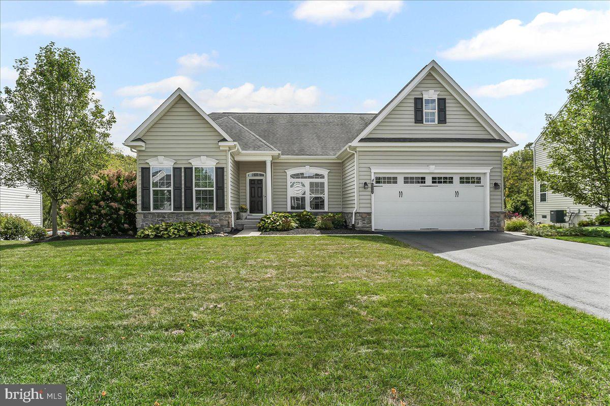 This is the one you have been waiting for and is truly one floor living at its best. Located in highly desirable Preserves at Inniscrone and Avon Grove School District this lovely 3 bedroom, 2 bath home was thoughtfully constructed with bump outs, beautiful hardwood floors, 10ft ceilings, a wonderful open floor plan, gourmet kitchen and so much more. There are two bedrooms on the left as you enter and an office/study with French doors on the right. From there the heart of the house calls you with its open floor plan. The great room has a gas fireplace and a wall of windows, the spacious kitchen includes an oversized island, GE Profile gourmet appliance package with a gas cooktop and double wall oven, ample cabinet and counter space, and a dining area overlooking the deck and yard. The primary bedroom suite is a retreat and features wood blinds, a tray ceiling, a walk-in closet, a bathroom with a double vanity and tile shower. Outside you will find a great deck with a Sunsetter awning and steps to the premium yard which is fenced and includes several raised beds. If you need extra space, the walkout basement is ready to be finished and is roughed in for a full bath. Lastly, recent improvements include new carpet in the bedrooms and paint throughout in 2023. This home has been beautifully maintained and you won’t be disappointed.