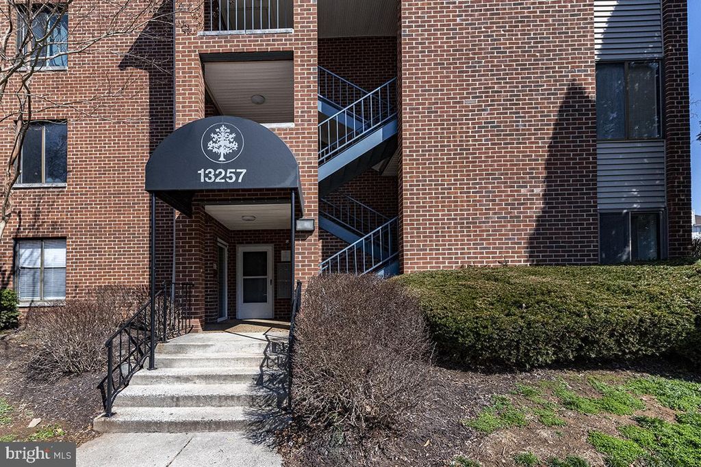 Photo of 13257 Wonderland Way #1-101, GERMANTOWN, MD 20874 (MLS # MDMC2203054)