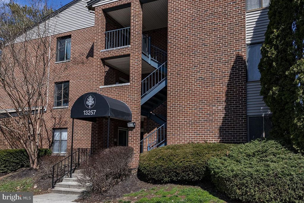 Photo of 13257 Wonderland Way #1-101, GERMANTOWN, MD 20874 (MLS # MDMC2203054)