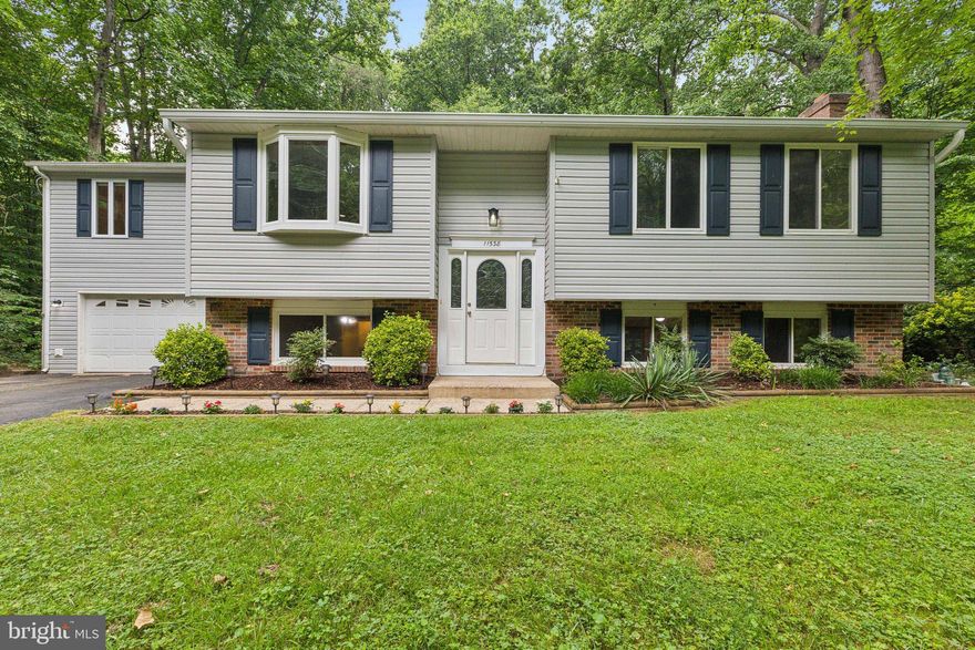 Nestled on a serene 1-acre lot, this charming split foyer home offers a perfect blend of comfort, space, and privacy. Boasting 4 bedrooms and 3 full baths, with 2 additional rooms above garage. Could be used as a game room, office, etc.  This property is designed to accommodate modern living while surrounded by nature's beauty.  As you step inside, you're greeted by a light-filled living room adorned with a large bay window that frame picturesque views of the lush surroundings. The adjoining dining area seamlessly flows into the well-appointed kitchen, complete with ample cabinetry and white appliances. Walk out to your beautiful screened in porch and out to the spacious deck. This level also hosts three generous bedrooms, including a large primary with its private full bath-soaking tub and separate shower. Each bedroom boasts abundant natural light and ample closet space, providing comfort and relaxation for all occupants. Remodeled Hall bath with new vanity, fixtures and tile flooring.  Descend to the lower level, where you'll find a spacious family room that serves as the perfect gathering spot for family movie nights or casual entertaining. Brick hearth wood burning fireplace and built in bookshelves. Also features a light filled sun room with tile flooring!  An additional bedroom and full bath on this level offer versatility and convenience, ideal for guests or multi-generational living arrangements. Step outside to your expansive backyard oasis, where you can unwind on the deck overlooking the sprawling lawn, perfect for outdoor activities and entertaining under the open sky. With 1 acre of land at your disposal, there's ample space for gardening, recreational pursuits, or simply enjoying the tranquility of nature. Conveniently located to shopping, dining and recreation, this home offers easy access to major highways and roadways, ensuring seamless connectivity to the surrounding area. Fresh Paint and new carpet are just a few of the upgrades that make this home a must see! Don't miss the opportunity to make this serene retreat your own! Welcome Home!