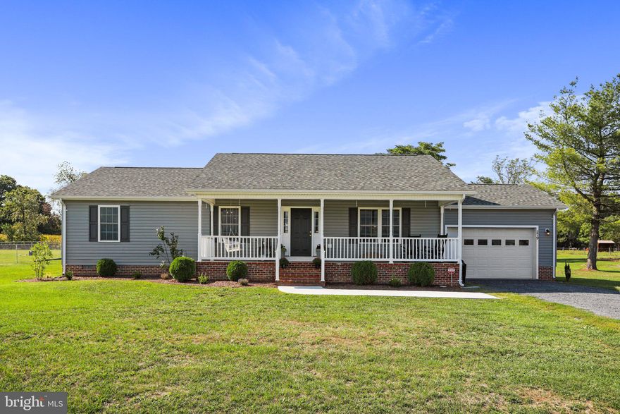 Situated on over half an acre of level land, this 1872 sq ft Ranch home offers three-bedrooms and two full bathrooms.  The open concept layout allows for seamless movement between living spaces.  It features hardwood floors throughout, except for the two secondary bedrooms which are carpeted.  A one-car garage and gravel driveway provide convenient parking. The backyard is perfect place to enjoy the outdoors - as the property offers stunning pasture and mountain views!  Many updates have been done throughout the house including custom storage space in the garage and a paved walkway from the driveway to the porch.  Great location - less than 5 miles to I-81 and several nearby wineries/breweries.  Schedule your showing today!