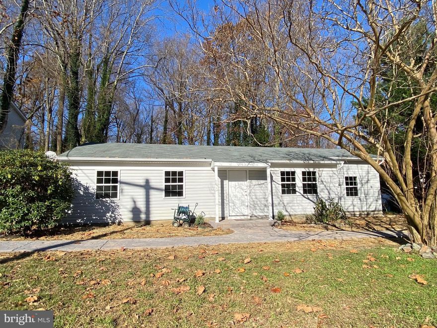 Ready for new owner.  New roof, new siding & gutters, replacement windows.  House has been freshly painted & has new flooring.  Kitchen has new cabinets. Long Beach Civic Assoc is voluntary for beach access.