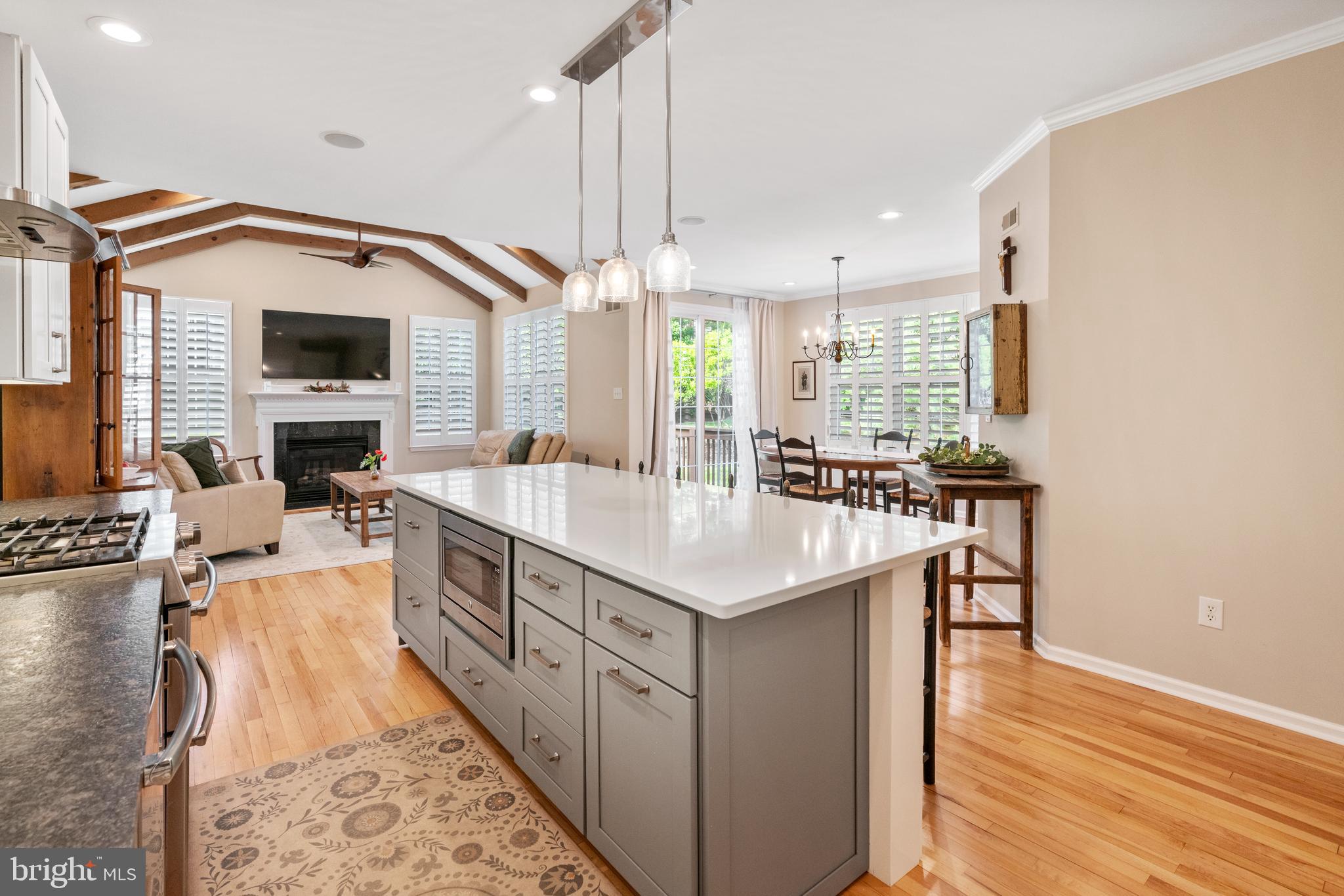 Welcome to 285 Cherry Lane in Kennett Square. Rare End Unit Townhome with Luxury Upgrades and spacious layout. Move-In Ready! Offered in the desirable Schoolhouse Lane community and located in the highly acclaimed Kennett School District. This stunning home offers over 3,400 square feet of tastefully upgraded living space. From high-end finishes to thoughtful design, this home has modern elegance and cozy charm and won’t stay on the market long! Step into a home that feels like new construction, thanks to a long list of recent upgrades: kitchen, baths, flooring, closets, roof, and more. The open-concept layout is accented by decorative ceiling beams, plantation shutters, and high ceilings that blend warmth with sophistication along with a Chefs Kitchen built to perfection. Designed to impress, the gourmet kitchen boasts custom white and gray solid wood shaker-style cabinets, striking champagne hardware, quartz and granite countertops, large subway tile backsplash and a spacious pantry. Pendant and recessed lighting for ambiance and functionality. Oversized island with seating for four with built-in microwave, upgraded gas range with griddle, double oven with a custom vent hood, French-door refrigerator and built-in dishwasher. Enjoy relaxing in the sun-drenched bonus room or set up a home office in this versatile space featuring bay windows, crown molding, with French doors and ceiling fan. The cathedral-ceiling family room with decorative beams, gas fireplace, and large windows make it easy to entertain with the open concept to the elegant dining area and kitchen. Step out through sliding glass doors to a deck ready for summer evenings. Retreat to the Luxury Owner’s Suite that features a tray ceiling, recessed lighting, ceiling fan, double walk-in closets and a spacious en-suite bath with porcelain tile floors, soaking tub under a transom window, dual vanities with quartz countertop, walk-in porcelain tiled shower with the separate water closet and linen storage. Thoughtful features include low-maintenance living, Energy Efficient gas furnace, central A/C, public water/sewer and not to mention Kinetico whole house water treatment and reverse osmosis drinking systems. Home is also wired with EV charging outlet. HOA includes snow/trash removal, lawn care, and exterior maintenance. The open layout is ideal for modern living with ample storage throughout. Located in East Marlborough Township, just minutes from Kennett Square. Enjoy Square shops, restaurants, and major routes to Wilmington, West Chester, Philadelphia and surrounding areas. Don't miss this rare opportunity to own a meticulously upgraded, move-in ready home in one of the most sought-after communities in the area. Schedule your private tour today before its gone!