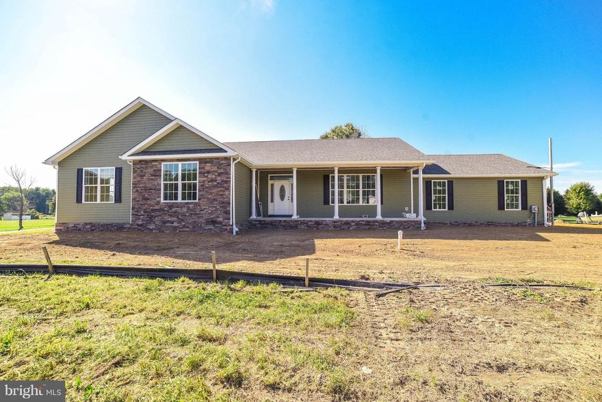 Brand new beautiful Rambler. 3 bedrooms 2 full baths, engineered wood flooring and tile bathrooms. Gas stone fireplace, granite counters, 12x16 deck and an open floor plan. 2200 sq. ft with a 26x26 finished garage. All on a little over an acre.