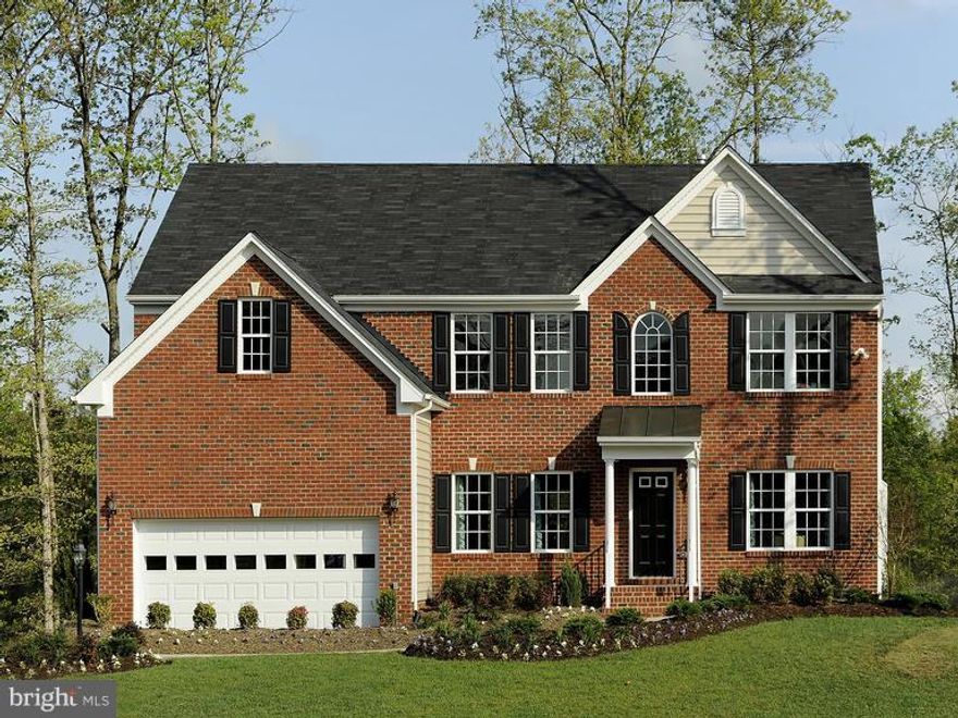 Comp Sale   Ravenna built to customers specifications. Upgrades inc. Brick Front, First Floor Bedroom, Morning Rm, First Floor Bedroom, Upgraded Granite & Cabinetry in Kitchen, Hardwood Flrs. Premium wooded homesite. Images shown are representative only.