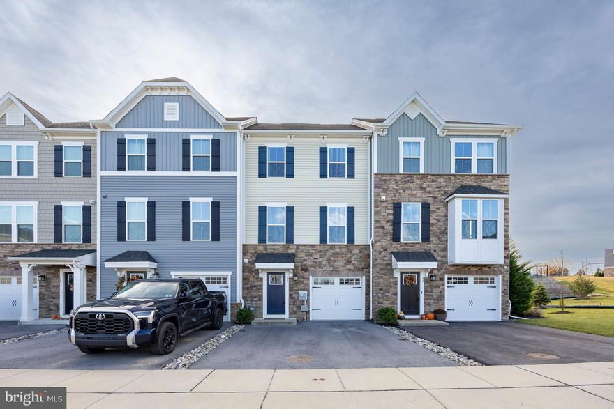 Welcome to 54 Glory Maple Ln. in the popular Mapleview community! Serviced by the award-winning Downingtown Area School District, this 4 bed, 2.1 bath home boasts inviting living spaces, a gorgeous modern kitchen, and flexible spaces that you can make your own. Stepping inside, the ground level offers a half bath and large room that would make a great bedroom or media room. Sliders from the ground level lead out to the backyard. The second level of the home opens up into a spacious living room with attractive luxury vinyl plank flooring that flows into the kitchen and dining areas. You will love the modern kitchen with white cabinets, quartz countertops, an oversized island with plenty of seating, and stainless steel appliances. Sliders in the dining area lead out onto the peaceful back deck with views of neighboring greenspace that provides the perfect setting for quiet evenings or outdoor gatherings. Upstairs, you will find a spacious primary bedroom featuring a beautiful en-suite bath with double sinks and a generous walk-in closet. Two more bedrooms with closets are serviced by a full hall bath, and laundry is conveniently located in the hall as well. At only 4 years old, this property is in great shape and sits close to Rt. 30 for easy commute options. This property is availble for lease immediately. Cats and small dogs are ok with a max 35 lb. weight limit. Come see this incredible property! Schedule your tour today!!