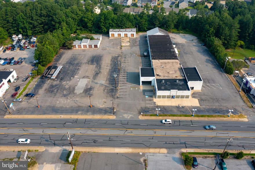 Portfolio Sale: 24,000 SF +/- Former Car Dealership & Service Center Situated on Three (3) Adjacent Parcels Consisting of Approx. 4.12 Acres off Great Mills Road.  Public Water & Sewer. Approx. 440 LF of Road Frontage along Great Mills Road. Zoned DMX (Downtown Core Mixed Use District). Re-Open as Car Center or Redevelop - Endless Opportunities!