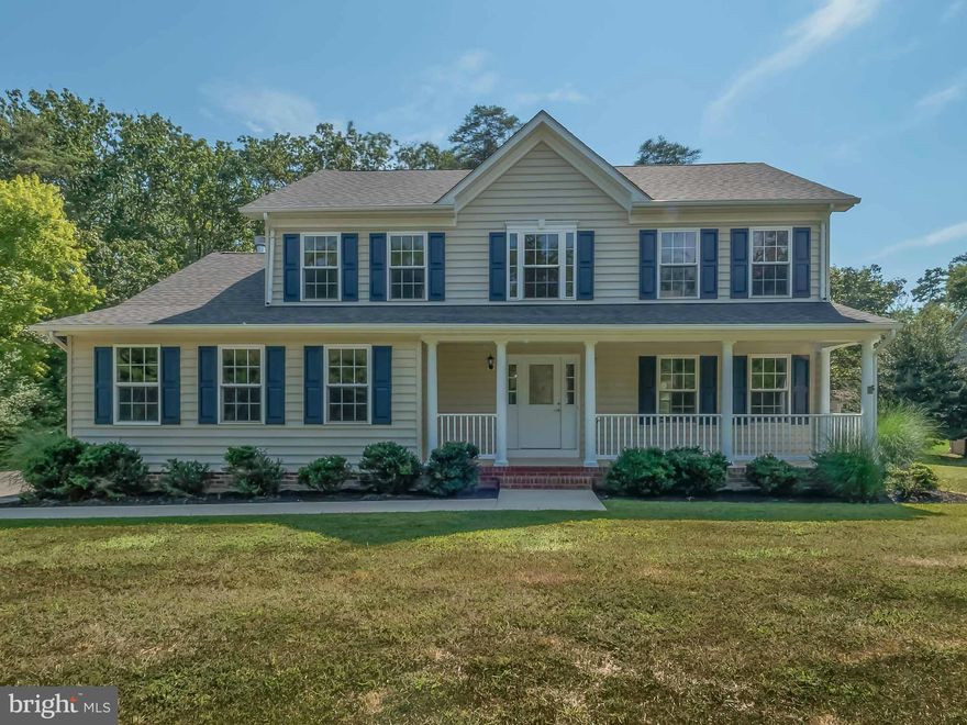 4 Bed, 3 bath, Over 3400 Finished sq. ft.  2 car side load garage,   1/2 Acre. , FP, front porch, rear deck,  2 Car Garage, Stunning kitchen w/ White Cabinets, Stainless Kenmore elite appliances, Quartz counters, Large island, hw Floors, FP. Master Suite is stunning...  Shower w/ dual shower heads, quartz counters & shower bench... too many upgrades to list. Walk to private beach
