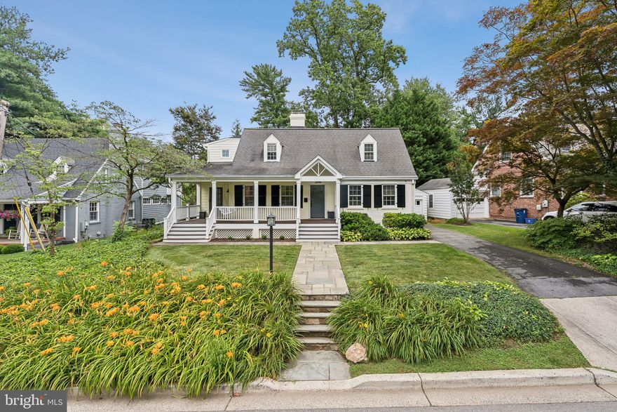 Nestled behind this charming bungalow with its romantic front porch is a distinguished
home offering a warm and inviting living room complete with a wood-burning fireplace. The
expansive family room opens through sliding doors to a two-tiered deck, overlooking a
meticulously maintained fenced yard adorned with mature trees and unique plantings. The
chef's kitchen features ample custom cabinetry, stainless steel appliances, and a sunlit
breakfast room. Whether for casual or formal dining, the private dining room with a built-in
china cabinet provides the perfect setting. The main level also includes a full bathroom, a
guest bedroom with decorative built-in shelving, plenty of closet space, a cozy home office,
and a mudroom with a private entrance. The second level boasts a primary bedroom suite
with a large walk-in closet, vaulted ceiling, a wall of windows offering lush garden views,
and a spa-inspired bathroom with dual sinks, a separate jetted Jacuzzi tub, a bidet, and a
full steam shower. Three additional bedrooms, a redesigned full bathroom, and walk-in
storage enhance the tranquility of this floor.The lower level features a spacious recreation
room, a sixth bedroom, a laundry/storage room, and a fourth full bathroom.
