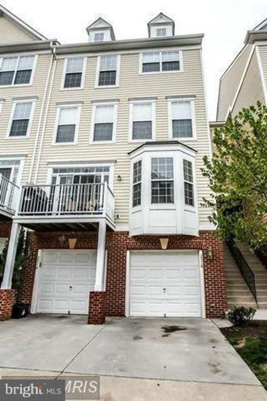 Amazing 1648 Sq. Ft. TH in a great location!! Features; garage, kit w/granite tops, SS Appl, b-splash & recessed lights, LR w/fireplace, bay window, wood floors & Nook out to balcony. Up levels with Gleaming new wood floors. Private M. Suite w/ walk in closet, tray ceiling, luxury M. BA with d-vanities, sep. shower, Soaking Tub. Near Airport, restaurants, schools, Town Ctrr, Metro and much MORE!!