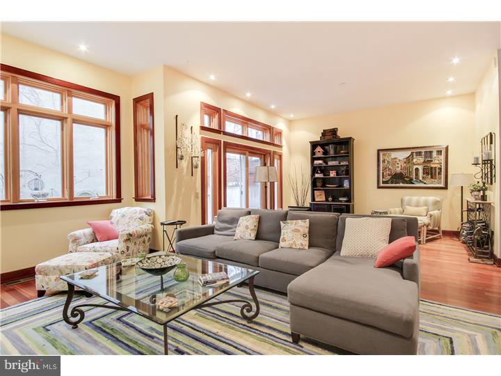 Contemporary & classic, this timeless Washington Square West double-wide home offers 5 bedrooms, 4.5 bathrooms, elevator, rooftop terrace, 2-car parking, and more. Enter your one-of-a-kind residence through a charming, gated front courtyard. Inside, an open kitchen features granite countertops, SS appliances, maple cabinetry, and breakfast bar. Bay windows and stunning finished wood floors line your 2-story dining area. The bright & spacious living area floods with natural light through oversized windows, and sliding glass doors leading to your generous yard, large patio, and green oasis. Upstairs, find a well-lit office or den, additional bedroom and sweeping, rear-facing Master suite. Your en-suite, marble Master bath includes double vanity sinks, shower, and jacuzzi tub. On the third level, find three spacious bedrooms, 2 full baths, sitting area overlooking your two-story bay windows, and den with access to your rooftop terrace with skyline views. Downstairs, a finished basement with full bath offers room for additional play, media room, or guest/au pair suite. A Wash West gem on a quaint block, just steps to the neighborhood's best!