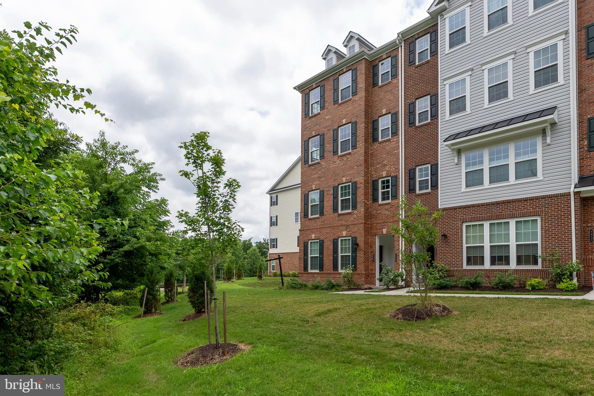 Immaculate 3BR/3BA Condo in Sought-After Ballard Green! Step into nearly 2,600 sq. ft. of pristine living space in this just-over-a-year-old, like-new top-level condo! The end-of-group, top-level location ensures privacy and minimal foot traffic! Barely lived in, this bright and airy two-level home is flooded with natural light, thanks to abundant windows throughout. The open-concept main floor features a spacious living room with sliders to a cozy deck, a made-for-entertaining spacious dining area, and a Gourmet kitchen with an expanded large island, granite countertops, stainless steel appliances, breakfast bar, soft-close cabinets, center sink, and sleek finishes throughout. There is also a versatile flex room off the dining area which can be used as a reading nook, small office, or storage area. Upstairs, the expansive primary suite offers an ensuite bath with a spa-like soaking tub, separate shower, and a generous walk-in closet. Two additional large bedrooms, a full bath, and a convenient laundry room complete the upper level. This home also features a private 1-car garage with driveway, energy-efficient hybrid water heater, and countless upgrades throughout. Enjoy low-maintenance living with an HOA that covers lawn care, snow and trash removal, and exterior building maintenance...water and hazard insurance are also covered! Resort-style community amenities include a clubhouse, pool, fitness center, park, and picnic area. Located in an amenity packed community, you're just minutes from Foundry Row, Mill Station, and major access routes. Don’t miss the opportunity to call this sun-soaked home your own—schedule your private tour today!