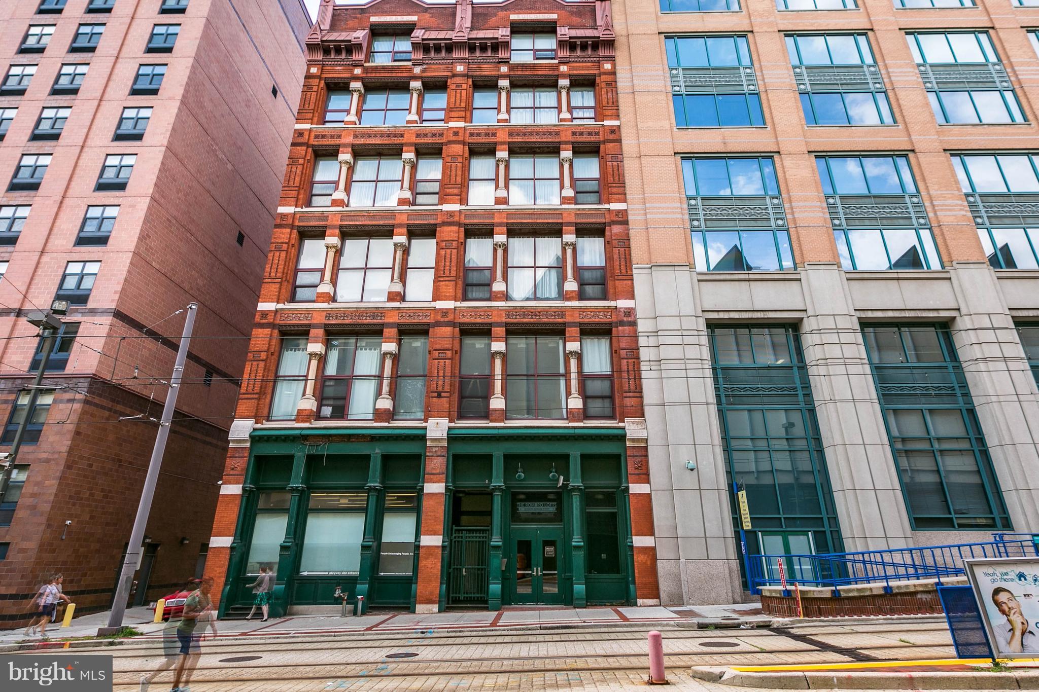 SELLER WILL PAY 6 MONTHS OF CONDO FEES IN ADVANCE, and condo fee includes water and gas bills! Loft style condo in downtown boasts 11 ft ceilings, a gorgeous Palladian window w/ exquisite view of the historic Bromo Seltzer Tower, bamboo floors, exposed ductwork, granite counters, breakfast bar, huge walk-in closet in Master BD, spacious den that could be used as a second bedroom.