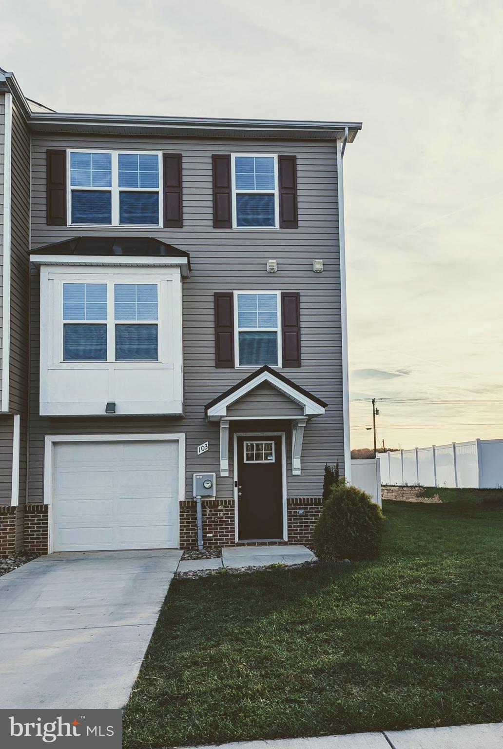 Welcome to The Communities of Burwell! This well-maintained and energy-efficient townhome features a 1-car garage, 4 bedrooms, and 3.5 bathrooms.
On the main level, you'll find a spacious living room with a bump-out, recessed lighting, a ceiling fan, and luxury vinyl plank flooring. The kitchen and dining area boast granite countertops, a large corner pantry, recessed LED lighting, and stainless steel appliances.
Upstairs, the primary suite is accentuated by a cathedral ceiling. The primary bathroom features a fully tiled gray shower with a bench and glass door, along with dual sinks. Bedrooms 2 and 3 are equipped with ceiling fans and lights and share a full bathroom. You'll also find a laundry room on this level.
For connectivity, CAT5 and COAX HDMI outlets are located in high and low positions in both the owner's bedroom and living room, with additional CAT5 and COAX connections in the guest rooms and kitchen.
Step outside to enjoy the spacious 12x16 back deck, which has stairs leading down to a 19x19 concrete patio below. A white 6-foot vinyl privacy fence with a gate ensures your comfort and privacy.
Schedule your tour today!