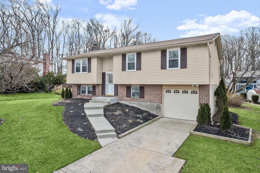 Spacious home located in the desired Woodbridge Valley community of Catonsville.  Lovingly maintained by the original owners, this home boasts recent updates including the roof, water heater, heat pump and more.  Enter a bright and airy open floor plan offering living and dining areas.  You’ll love preparing your favorite meals in the roomy kitchen that features a granite countertop and offers a breakfast nook with deck access.   Retire to the primary bedroom that has an attached full bath, with two additional bedrooms and a hall bath, highlighting a granite vanity top, completing the main level.  The lower level includes a powder room, laundry, utility and storage rooms, and a family room with a beautiful brick accent wall surrounding a wood burning fireplace and sliding door access to the backyard.  Enjoy outdoor living in the huge, level backyard on the expansive deck and patio.   Explore the outdoors in Rockburn and Patapsco Valley State Parks and Cascade Falls. Entertainment, shopping, and dining awaits with Lurman Woodland Theater, Benjamin Banneker Historical Park & Museum, and Merriweather Post Pavillion. Major commuter routes include I-695, US-40, and I-95.