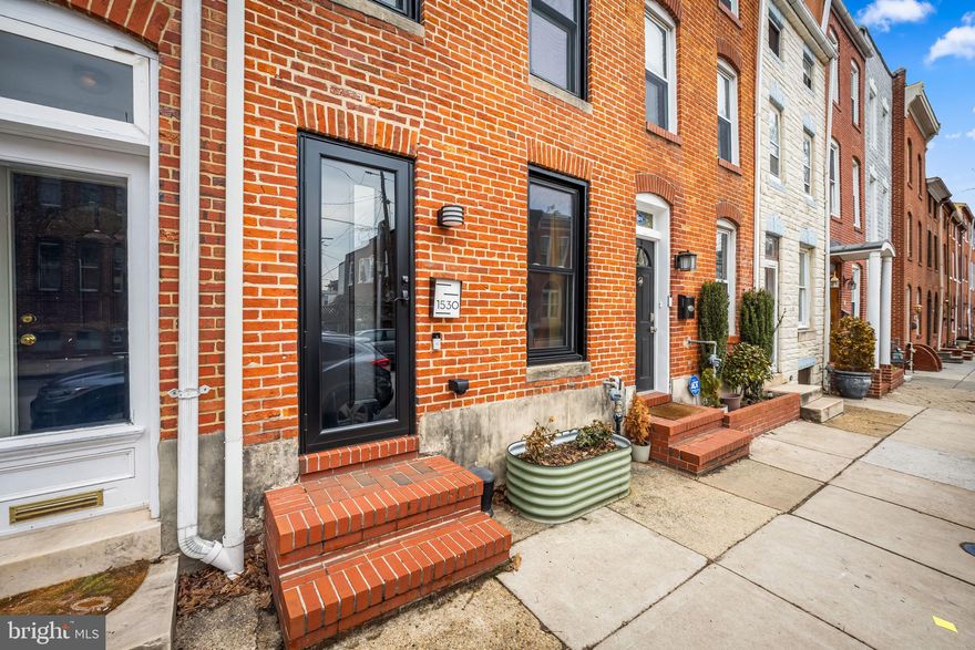Welcome to 1530 Riverside Ave — a true Baltimore gem blending historic charm with modern updates in one of the city’s most sought-after neighborhoods: Riverside.

This beautifully maintained home features  2 spacious bedrooms and bathrooms on the upper levels, and the always coveted, convenient half bath on the main level. Inside, you’ll find exposed brick, rich hardwood floors throughout, a cozy gas fireplace, and energy efficiency with the new windows and new doors, creating a warm and inviting atmosphere.

Step outside and prepare to be wowed by the tiered rooftop deck complete with a projector screen — perfect for warm summer nights under the stars. Take in the stunning water and city views that make city living so special. This home also includes an off-street parking pad, providing the convenience every city homeowner appreciates.

Full of character, thoughtful upgrades, and unforgettable outdoor space, 1530 Riverside Ave offers the very best of Baltimore charm with modern comfort.