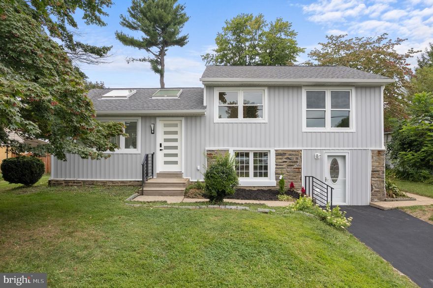 ***OPEN HOUSE SUNDAY 9/8/24 from 12pm-3pm*** Welcome to this completely remodeled split-level home that perfectly blends modern luxury with functional design. This stunning home boasts comprehensive updates from top to bottom, including a brand new roof, foam roof insulation, drywall, wall insulation, electric wiring, plumbing, heating and central air conditioning installed with all applicable permits and inspections. Located in the desired neighborhood of Northeast Philadelphia. The upper level features three bedrooms, with large windows that let in plenty of natural light. This level also includes a luxurious bathroom equipped with both a shower and a tub, providing a spa-like experience. On the main level, you’ll find a huge open space that seamlessly integrates the living room, dining area, and a gourmet kitchen. The kitchen is a chef’s dream, boasting a large island with pop-up electric plugs, high-end stainless steel appliances, and elegant countertops, all illuminated by skylights that flood the space with natural light. The lower level includes an additional room perfect for a home office, guest room, or playroom, a conveniently located laundry room with modern appliances and plenty of storage, and a luxurious bathroom with high-end fixtures and finishes. Outside, big deck overlooks a beautiful closed backyard, providing a private oasis for relaxation and outdoor activities. Every inch of this home has been thoughtfully remodeled to provide a luxurious living experience, from the high-quality materials used throughout to the meticulous attention to detail.