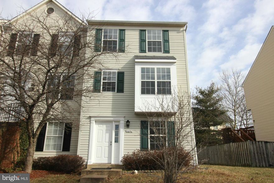 Don't miss this STUNNER! Won't last!! 4BR, 3BA end TH in the desirable Ashburn Village w/ great amenities. Open concept main w/  LR&DR combo & SGD to large wood deck. NEW eat-in KIT w/ bay window, granite c-tops, SS apps, glass b-splash, gas cooking, new cabinets. New carpet, tile, & paint t-out. Family room w/access to brick patio, full BA, and BR. Walk to shopping center, pools, tot lots, more