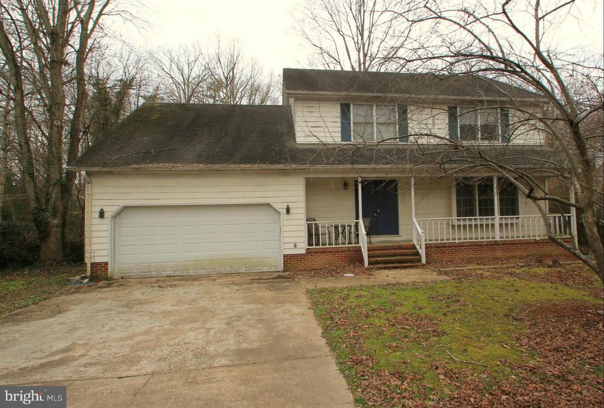 Fully Approved Short Sale! Quick Close!! Spacious home with a traditional floor plan. Large kitchen with lots of cabinets and work space. Huge family room with wood burning fireplace. Light filled Sun Room overlooking private backyard. Excellent location close to great shopping and schools! No HOA!