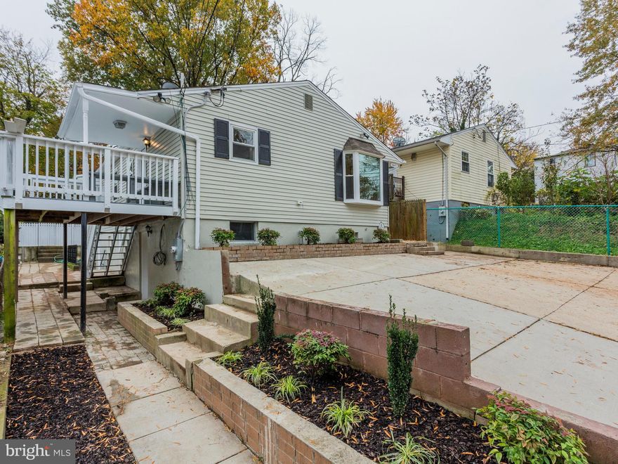 Alarm is on!!! Beautiful renovation .Large floorplan.Hardwood floors throughout,gourmet kitchen w/custom cabinets,marble counters,stainless steel appliances,deck,upscale bathrooms w/marble tile & custom vanities,basement w/ rec room,wet bar,2 bedrooms & full bath w/private entrances perfect for xtra income.All new systems,large backyard,mins 2 Takoma Park & Fort Tottem metro