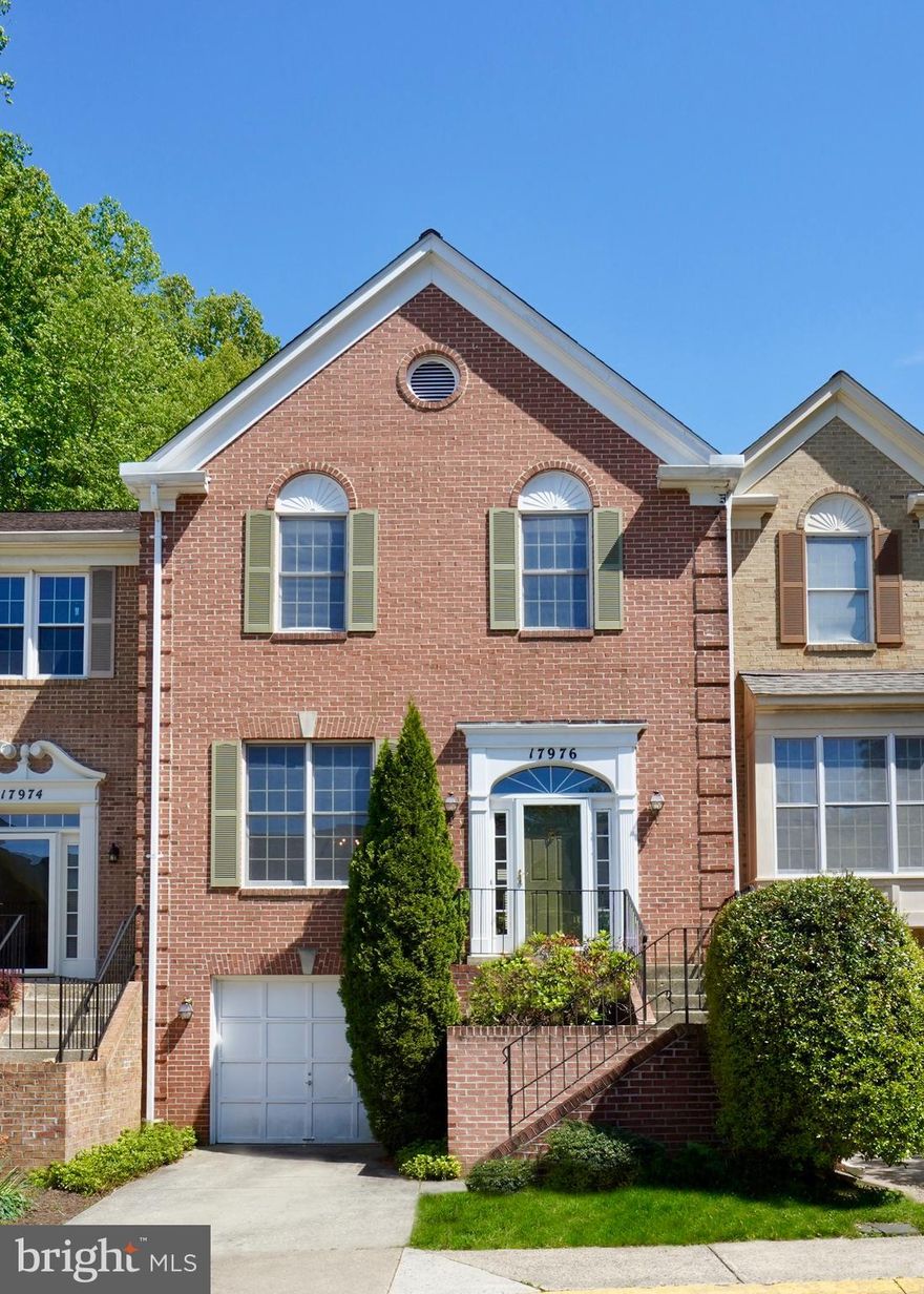 Welcome to this beautiful brick-front garage townhome in the highly desirable Lake Hallowell community. Nestled on quiet Dumfries Circle, this enclave of spacious townhomes sits just moments from the lake and offers some of the finest townhome living in Olney.

Step inside to an open and airy floor plan featuring soaring ceilings and a grand entry foyer that gives the home the feel of a detached residence. The main level showcases gleaming hardwood floors, an expansive living room, elegant formal dining room, convenient powder room, and a spacious kitchen ready for your personal vision and finishing touches.

Upstairs, you’ll find three generously sized bedrooms, a full hall bath, convenient upper-level laundry, and an exceptionally large owner’s suite designed for comfort and relaxation.

The finished lower level offers a large recreation room with a cozy fireplace, an additional powder room, and abundant storage space.

Enjoy all that the Lake Hallowell community has to offer, including a swimming pool, tennis courts, community center, scenic lake, walking trails, playgrounds, and more. Located just minutes from the heart of Olney, this home combines comfort, space, and an unbeatable location.