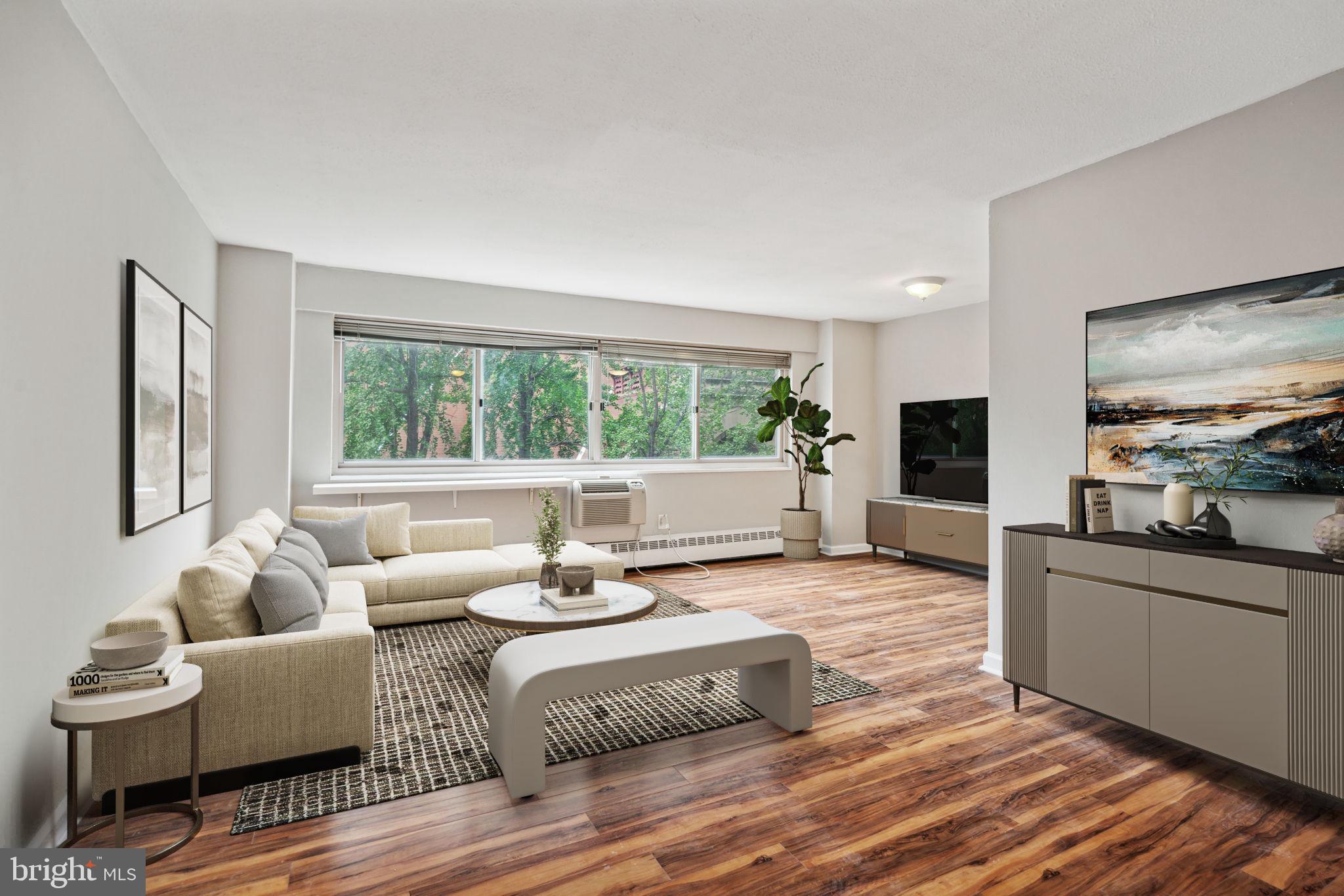 Welcome to Riverwest Unit 415, a bright corner unit w/ center city views! This large 2 bedroom unit offers great space plus convenient details. The vestibule area is welcoming and features a large closet (big enough for more than just coat storage!), well maintained wood floors throughout, significant windows with natural light pouring in, stainless steel appliances in the kitchen, including full size dishwasher, upper and lower cabinets for storage, complemented by counter lighting. There is a perfectly situated breakfast nook/ dining room/home office space next to the main living room that is surrounded by wall to wall windows w/ unobstructed city views. The updated full bathroom has chic marble, modern finishes and fixtures, shower surrounded by marble and matching tile floor and sleek glass doors. Two roomy bedrooms w/ ample-sized closets, more city views and custom-controlled heating/a/c units. Convenient building amenities to complement this special unit: on-site gym, community/media room, laundry facility, amazing staff and front desk concierge. Several parking options nearby (including a garage right across the street plus other garages, lots and permit parking options), per availability. You'll love the gorgeous first floor lobby, multiple elevators, high ceilings, secure entry, mailroom and secure package deliveries inside the building. Enjoy the best of both worlds, in the heart of Center City, w/ everything at your doorstep, at the popular RiverWest building. Easy access to/from major highways, bridges, public transportation, bike lanes, walk score 99!