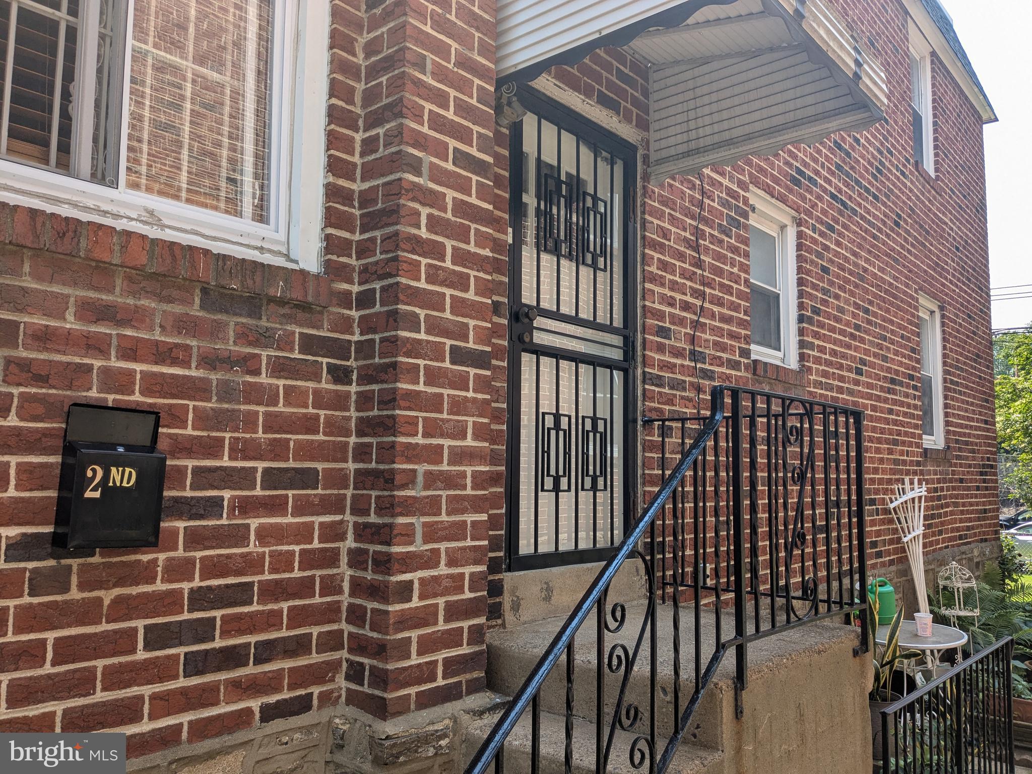 2nd floor apartment. All hardwood floors. Large Living Room/Dining Room. Walkway to 2 separate bedrooms. Modern kitchen and modern bathroom. Ample closet space. Move in ready. New carpets where shown. Freshly painted. Excellent location, No access to washer and dryer.