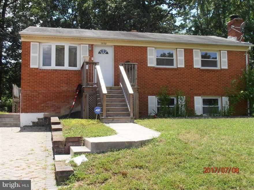 Incredible huge lot. All brick w/ Florida room in back. Newer, furnace (relocated to basement), water heater, electric panel - great bones. New awesome bathroom plus new half bath. This house needs TLC but is otherwise a fantastic find for a handy person or contractor. The lot itself is a rare find, almost 16,000 SF. private and treed yard backs to woods.
